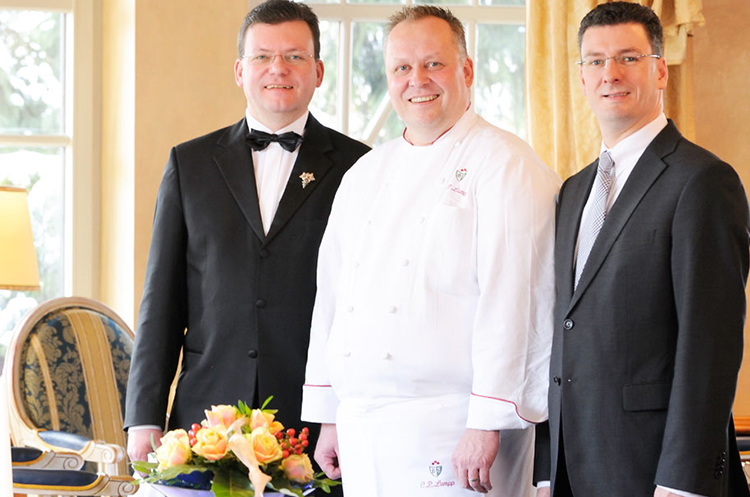 Chef Claus-Peter Lumpp in the middle with part of his team
