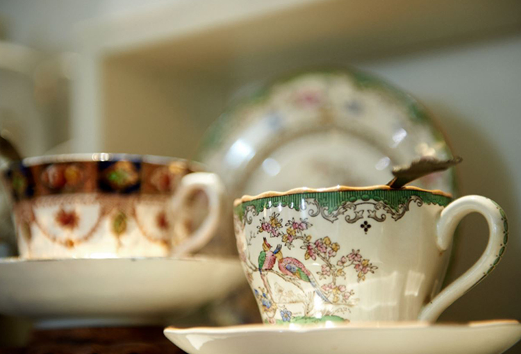 Tea is served in precious teacups