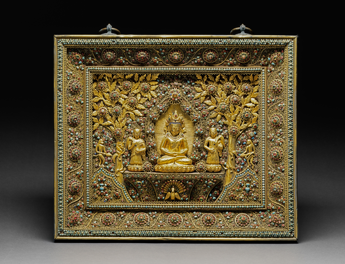 Plaque with Seated Crowned Buddha Nepal Shah period, 19th century Wood plaque, bronze, gilt, gilt wire, and jewels—pearls, garnets, turquoise, and gemstones 24 ½ x 20 ½ x 3 in. (62.2 x 52.1 x 7.6 cm.) Crow Museum of Asian Art, 1982.2