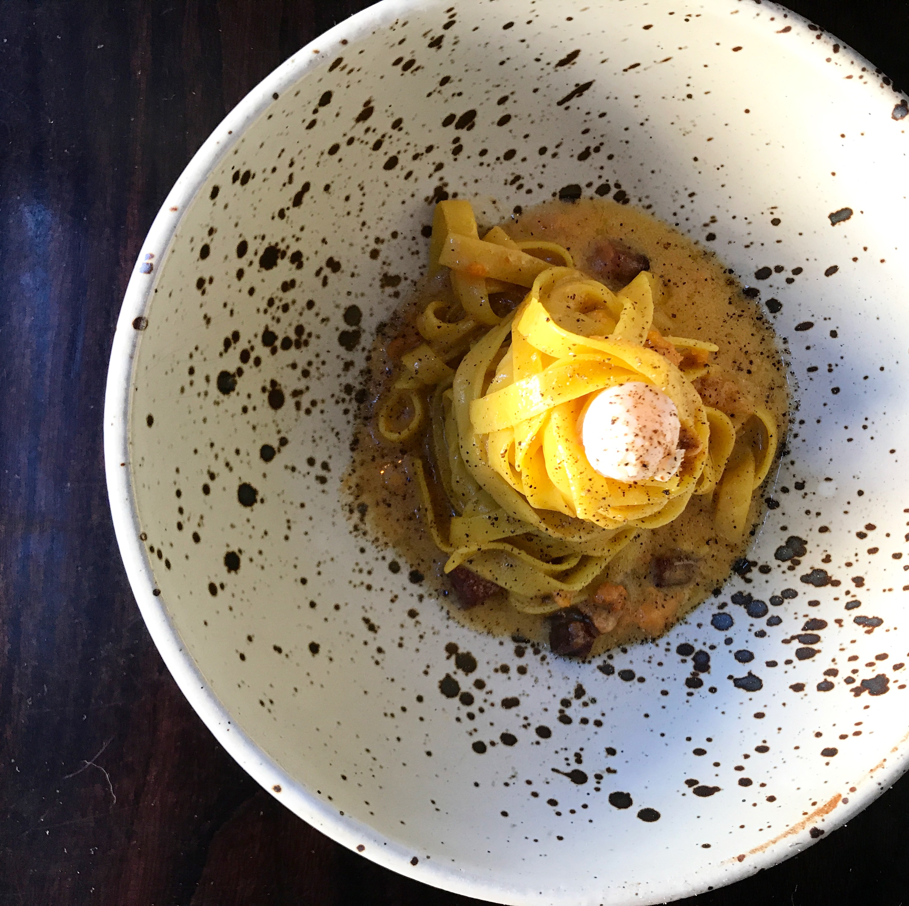 Smoked fettuccine with sea urchin and bacon.